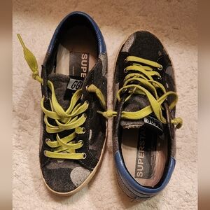 Rare Golden Goose sneakers with 2 pairs of shoe strings.